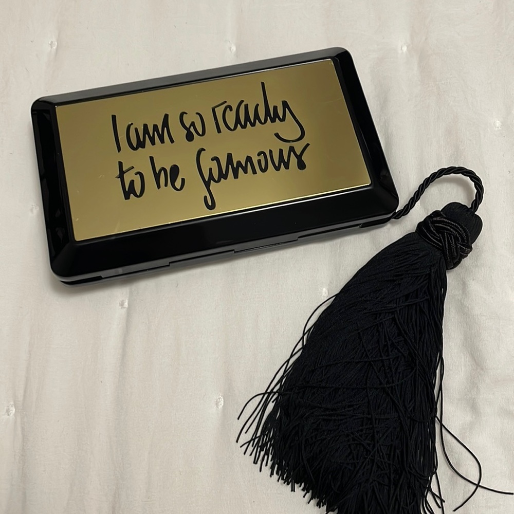 Kilian black and gold limited edition clutch